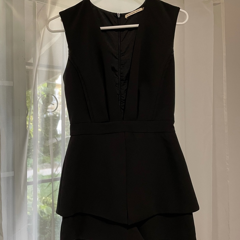 Deep v romper from Bloomingdales. Worn once